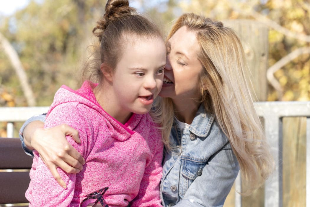 A heartwarming moment of Shauna Amick hugging her daughter, Sarah.