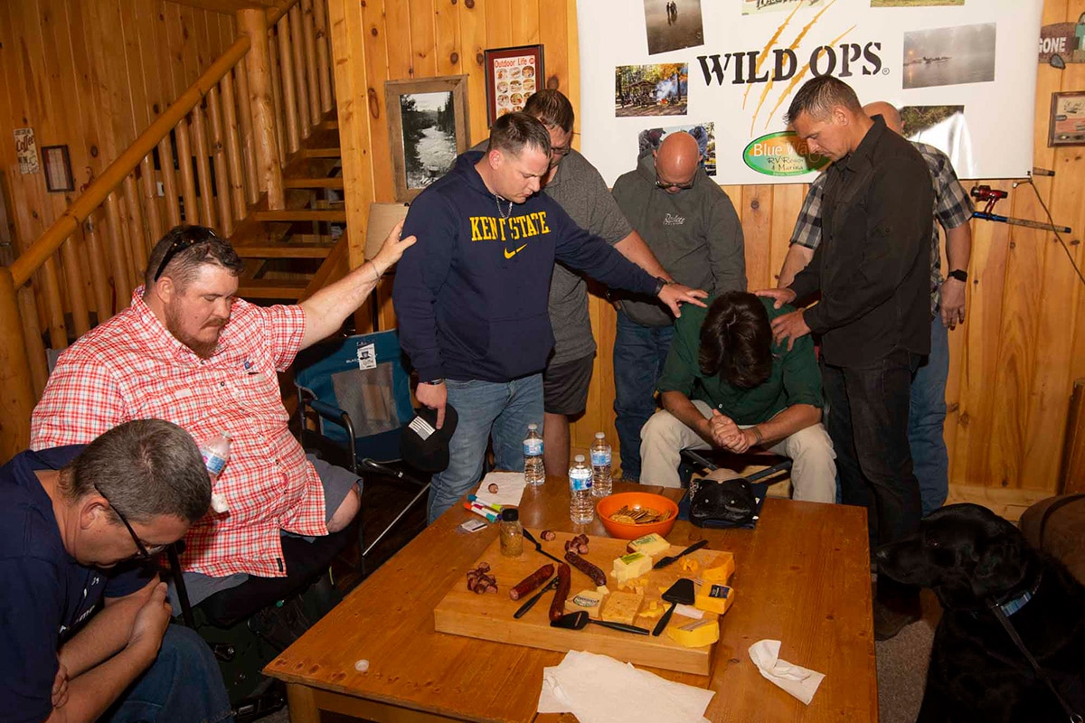 Veterans gather to pray at a Warrior Getaway
