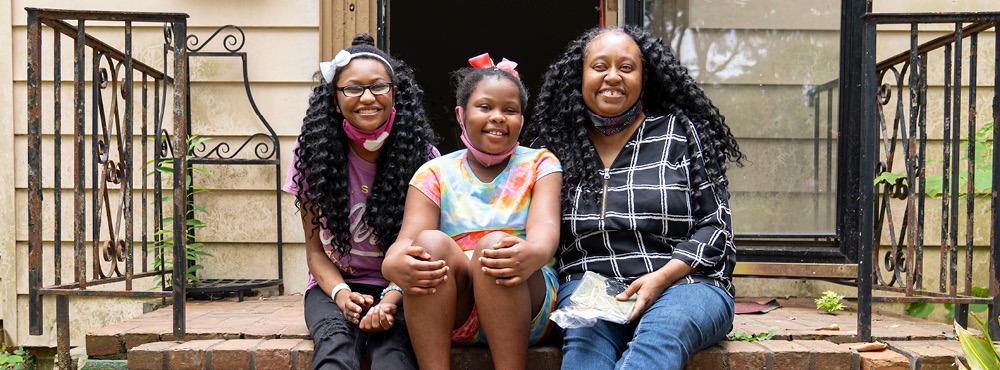 A family poses for a photo