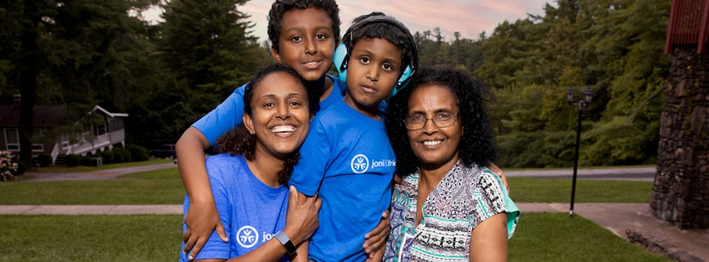 A family poses for a photo at Family Retreat