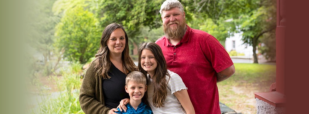 A veteran family poses for a photo at Warrior Getaway