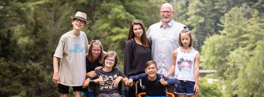 A family poses for a photo at Family Retraet