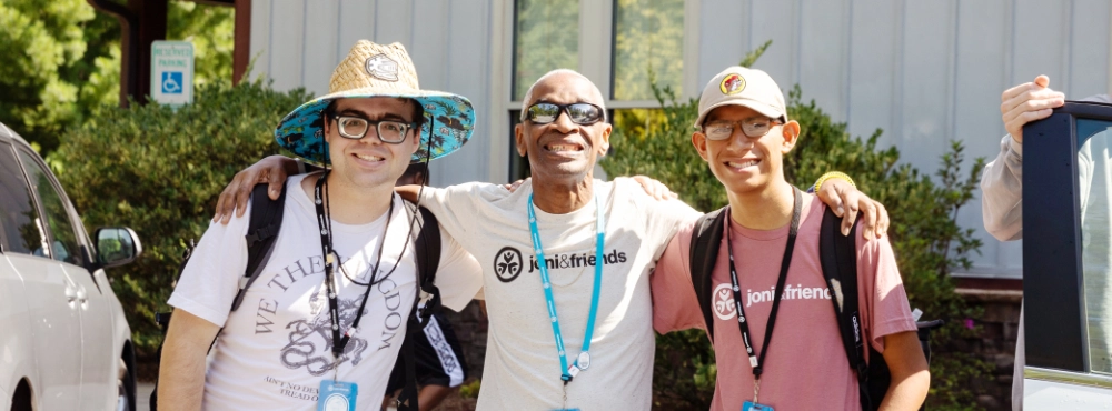 A group poses for a photo at a Family Retreat event